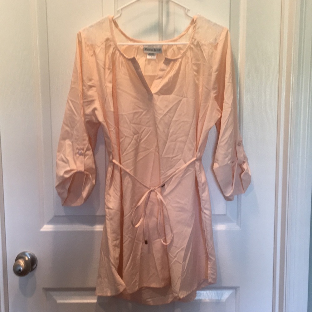 Pale pink maternity shirt.